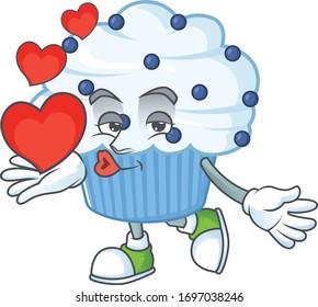 An adorable cartoon design of vanilla blue cupcake holding heart