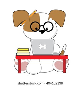 An adorable puppy is sitting at a laptop wearing glasses and has a pencil by his ear