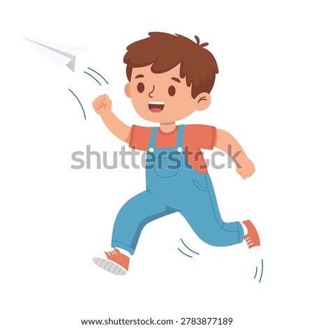 Adorable Young Boy Joyfully Playing with a Paper Airplane in a Dynamic Running Pose