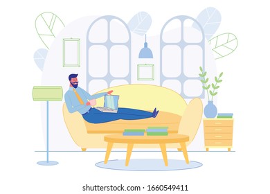 Adult Man Sitting Alone on Cozy Sofa and Work in Living Room Inside Home by Laptop and Drink Hot Coffee from Cup. Plants, Desk, Furniture on Background. Work on Comfortable Workplace in House