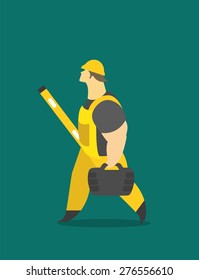 Adult man in a working form at work carries tools and measuring