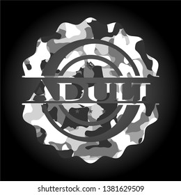 Adult written on a grey camouflage texture