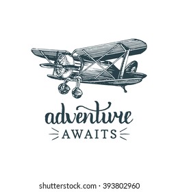 Adventure awaits motivational quote. Vintage retro airplane logo. Vector typographic inspirational poster. Hand sketched aviation illustration in engraving style. 