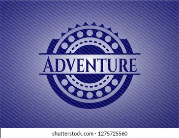 Adventure badge with denim background
