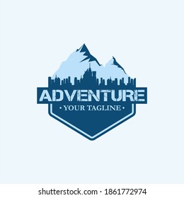 adventure logo with mountain and city landscape