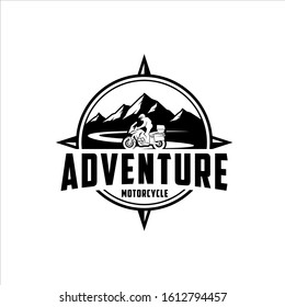 Adventure motorcycle cross mountain road - Shutterstock ID 1612794457
