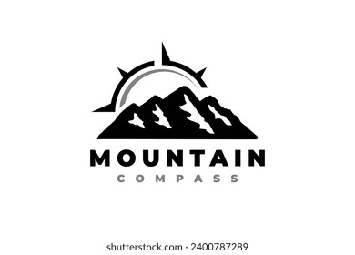 logotipo de la brújula de montaña de aventura