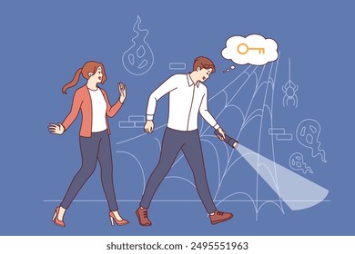 Adventure quest game in scary basement with cobwebs and ghosts for cheerful man and woman. Exciting quest with task of finding key in dark, scary room of abandoned castle inhabited by monsters