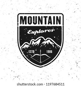 Adventure and traveling vector badge shield with mountains isolated on white background with removable grunge texture