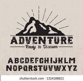 Adventure. Vintage serif modern alphabet. Retro typeface. Vector Font Illustration. Vector. Vintage badge.
