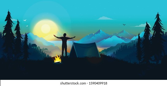 Adventurous man greeting the sun at the dawn of a new day. The sun is rising, with tent and campfire in a beautiful nature landscape. Camping alone, freedom, and a new beginning concept.