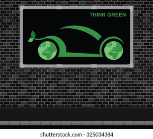 Advertising board on brick wall advertising think green car technology