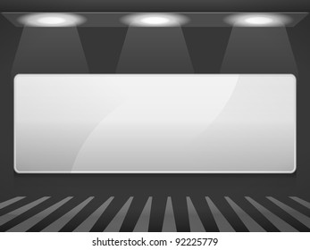 Advertising board on the wall with three lights
