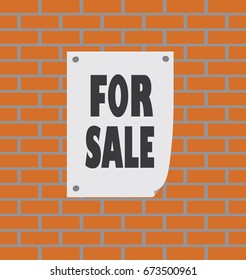 advertising paper against brick wall background 