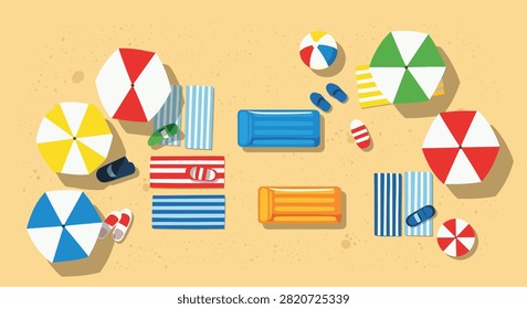 Aerial top view of a crowded summer beach with colorful umbrellas towels mats and various beach accessories on the golden sand background.