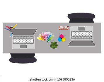 aerial view of desk with laptops computer and objects