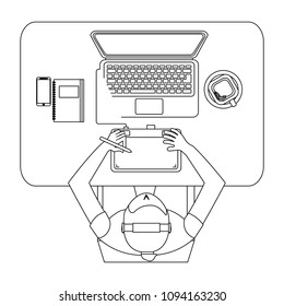 aerial view of graphic designer working with computer