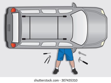 Aerial view of man attempting to do his own car repair