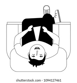 aerial view of young man sitting in sofa with cross leg