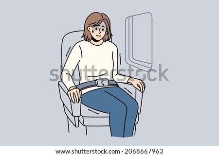 Aerophobia and being afraid of flights concept. Young stressed woman cartoon character sitting in plane near window feeling shock vector illustration 