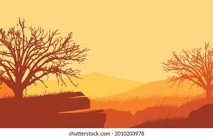 An aesthetically pleasing view of the mountains in the evening from the countryside with the silhouettes of dry trees. Vector illustration of a city