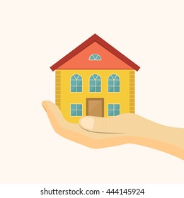 Affordable Housing Icon. House In Hand Vector Illustration. Flat Style