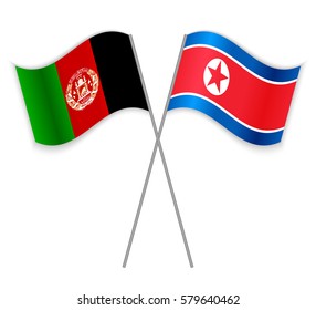 Afghan and North Korean crossed flags. Afghanistan combined with North Korea isolated on white. Language learning, international business or travel concept.