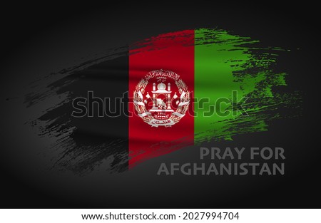 Afghanistan flag with Pray for Afghanistan next to it.