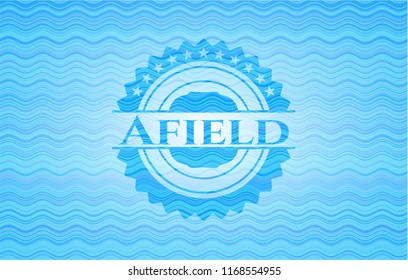 Afield sky blue water wave emblem.