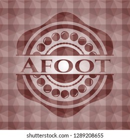 Afoot red emblem or badge with abstract geometric pattern background. Seamless.