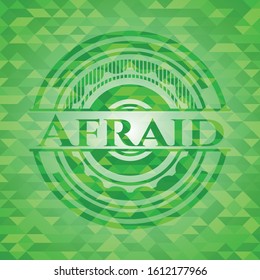 Afraid green emblem with mosaic background. Vector Illustration. Detailed.
