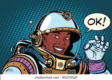 African American astronaut OK gesture, pop art retro vector illustration. Space and scientific research. Okay all good