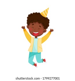 African American Boy Character in Birthday Hat Jumping with Joy Vector Illustration