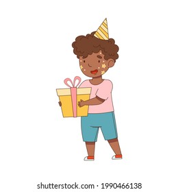 African American Boy Character in Birthday Hat and with Face Painting Carrying Gift Box for Party Vector Illustration