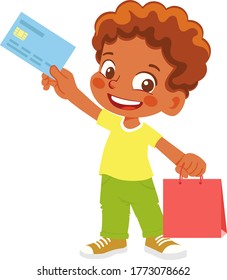 African American Boy holds credit card. Cheerful young man holding shopping bags