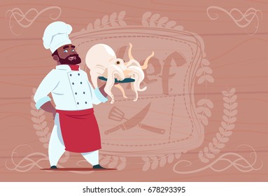 African American Chef Cook Hold Octopus Smiling Cartoon Restaurant Chief In White Uniform Over Wooden Textured Background Flat Vector Illustration