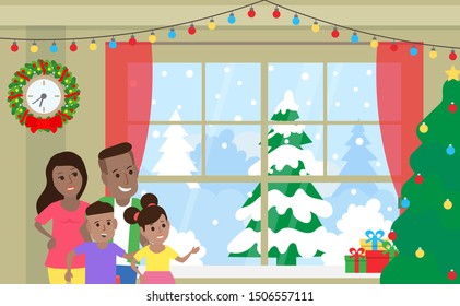 african american family at home look out the  window winter landscape. merry christmas and happy new year 