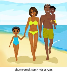 african american family walking happy along beach