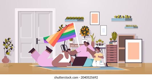 african american female parents with little child lesbian family transgender love LGBT community concept