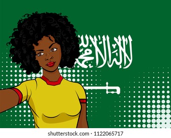 african american girl makes selfie in front of national flag Saudi Arabia in pop art style illustration. Element of sport fan illustration for mobile and web apps on national flag background