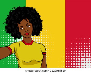 african american girl makes selfie in front of national flag Mali in pop art style illustration. Element of sport fan illustration for mobile and web apps on national flag background
