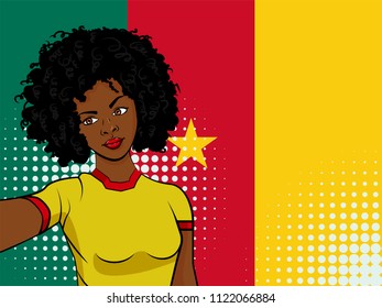 african american girl makes selfie in front of national flag Cameroon in pop art style illustration. Element of sport fan illustration for mobile and web apps on national flag background