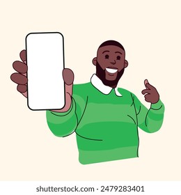 Hombre afroamericano con gran pantalla de teléfono señalando y sonriendo usando un color verde cuello redondo