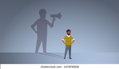 african american guy dreaming about being manager or boss screaming in megaphone shadow of business man with loudspeaker imagination aspiration concept full length flat horizontal