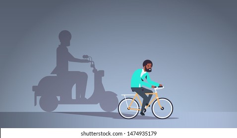 african american guy riding bike shadow of man on motor scooter imagination aspiration concept male cartoon character full length flat horizontal