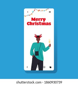 african american man in horns celebrating new year christmas holidays guy on smartphone screen having fun online communication concept portrait vector illustration