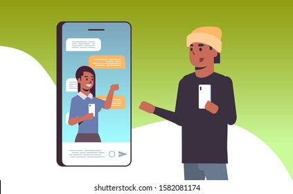 african american man using smartphone online conference video call with female colleague social network communication concept mobile application horizontal portrait vector illustration