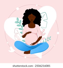 African american pregnant woman in lotus pose tenderly holds her belly on pink floral background