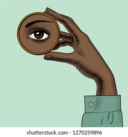 African American pretty girls. Black beauty concept. Female hand holding in fingers a round small mirror with a reflection of her eye. Vintage engraving stylized drawing. Vector Illustration 