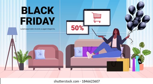 african american woman choosing goods on laptop online shopping black friday big sale holiday discounts concept living room interior full length horizontal copy space vector illustration